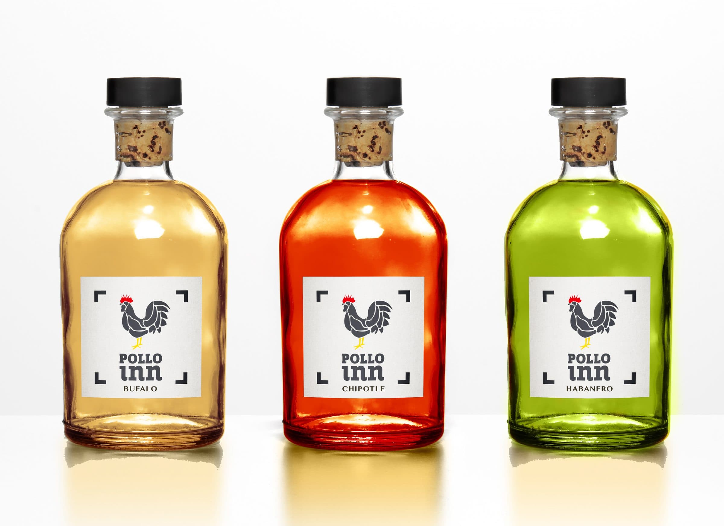 Three Pollo Inn hot sauce bottles, a brand designed by Bancorp